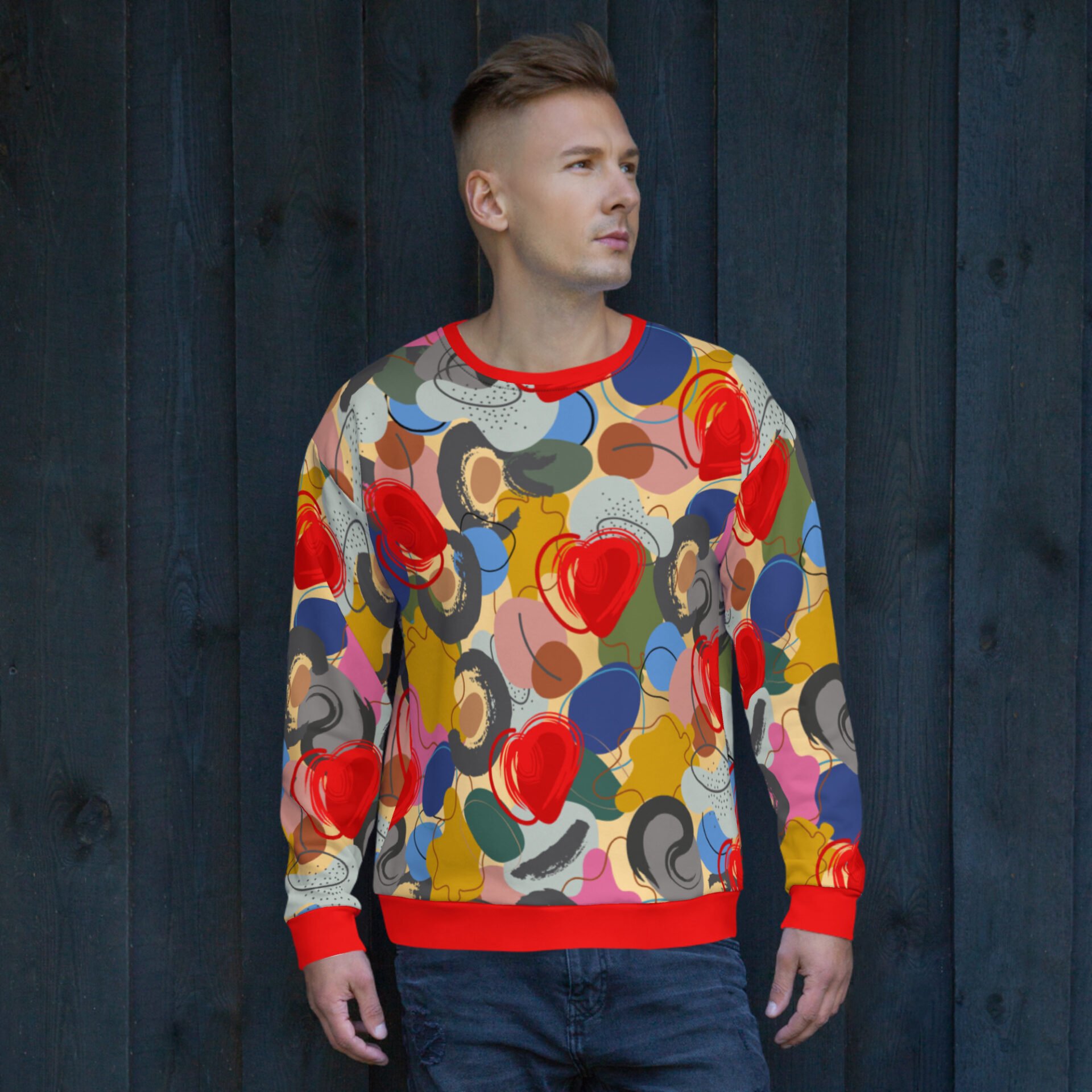 Unisex džemperis ar krāsainu apdruku abstraktā stiilā.